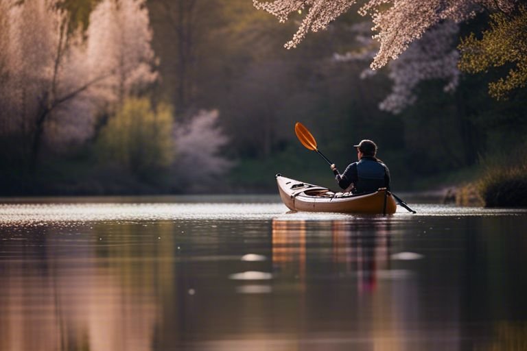 Angler catching fish from kayak in spring
